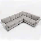 Canapé d'angle 6 places en chenille de 278 cm avec accoudoirs roulés cloutés
