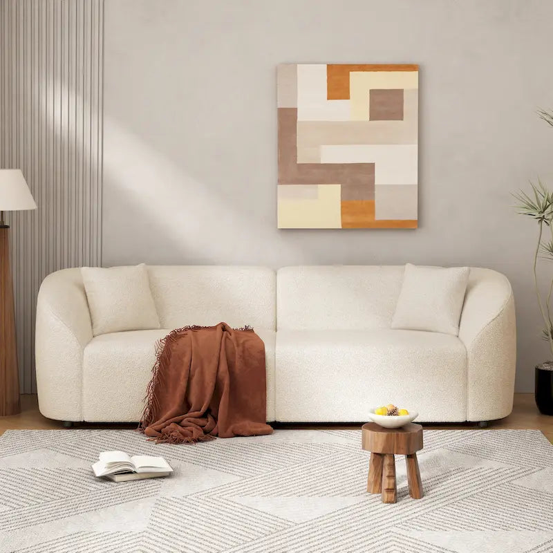 Canapé 3 places en bouclé incurvé sculptural de 222,25 cm avec design ergonomique