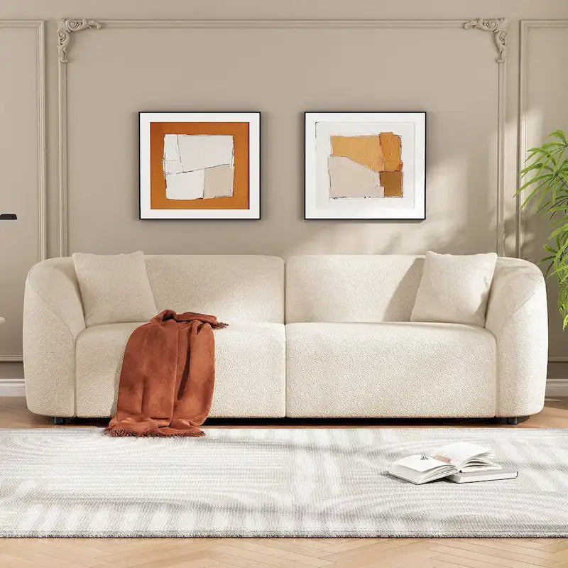 Canapé 3 places en bouclé incurvé sculptural de 222,25 cm avec design ergonomique