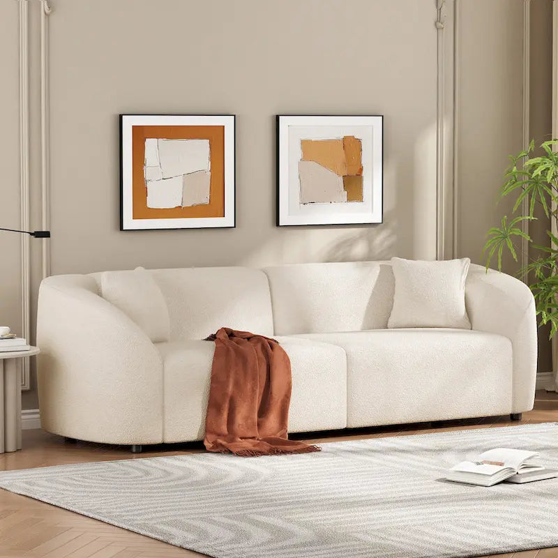 Canapé 3 places en bouclé incurvé sculptural de 222,25 cm avec design ergonomique