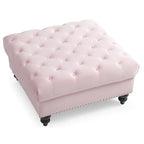 Grand pouf capitonné en velours avec détails cloutés