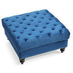 Grand pouf capitonné en velours avec détails cloutés