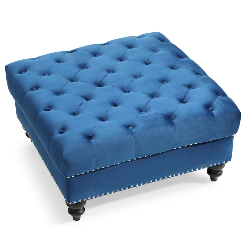 Grand pouf capitonné en velours avec détails cloutés