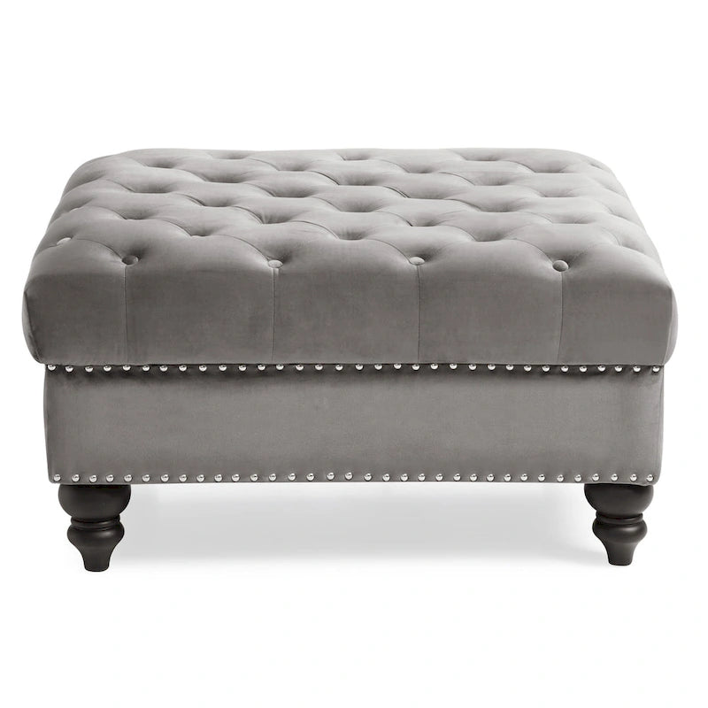 Grand pouf capitonné en velours avec détails cloutés