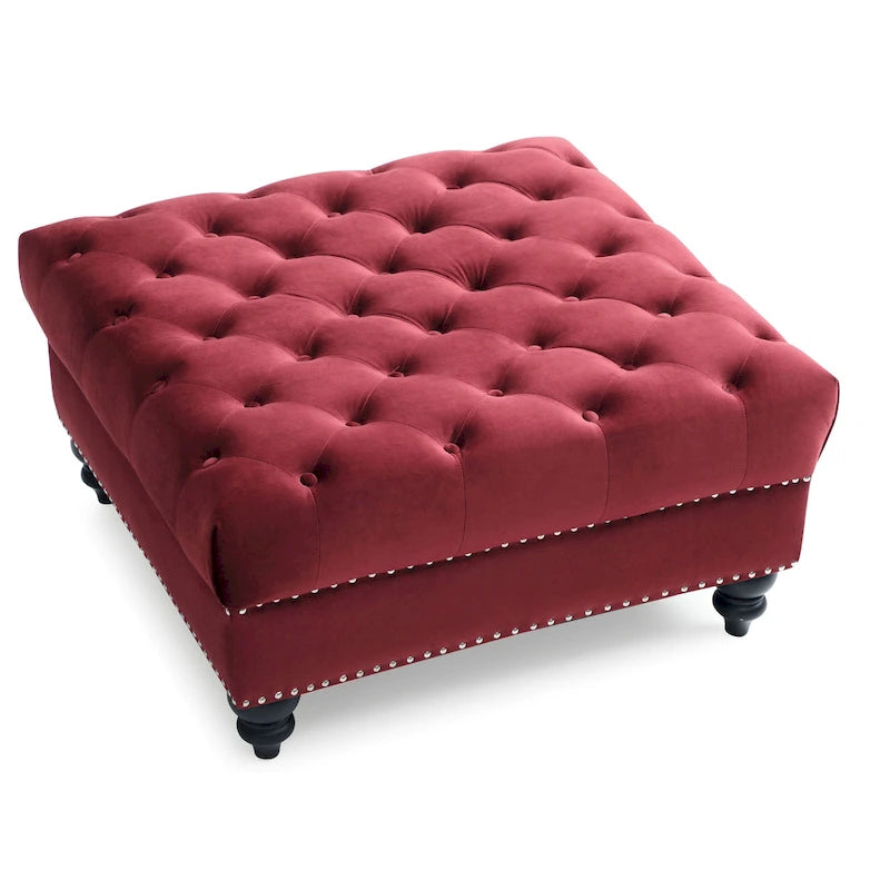 Grand pouf capitonné en velours avec détails cloutés