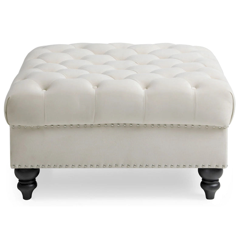 Grand pouf capitonné en velours avec détails cloutés