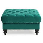 Grand pouf capitonné en velours avec détails cloutés