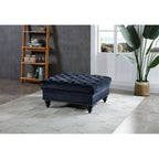 Grand pouf capitonné en velours avec détails cloutés